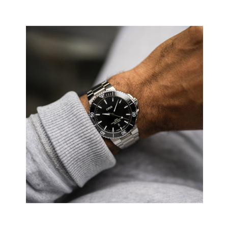 Reloj Oris Aquis Date 01 733 7789 4154-07 8 23 04PEB. Género: Hombre,Mujer. Material: Acero. Tamaño: De 43mm a 46mm. Correa: Acero. Color esfera: Negro. Estilo: Casual,Deportivo,Cocktail. Movimiento: Automático. Características técnicas: Hora y segundero,Calendario,Reserva de marcha