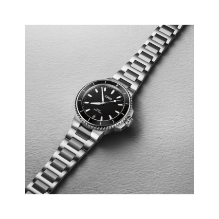 Reloj Oris Aquis Date 01 733 7792 4154-07 8 19 05P. Género: Mujer,Hombre. Material: Acero. Tamaño: De 32mm a 38mm. Correa: Acero. Color esfera: Negro. Estilo: Casual,Deportivo,Cocktail. Movimiento: Automático. Características técnicas: Hora y segundero,Calendario,Reserva de marcha