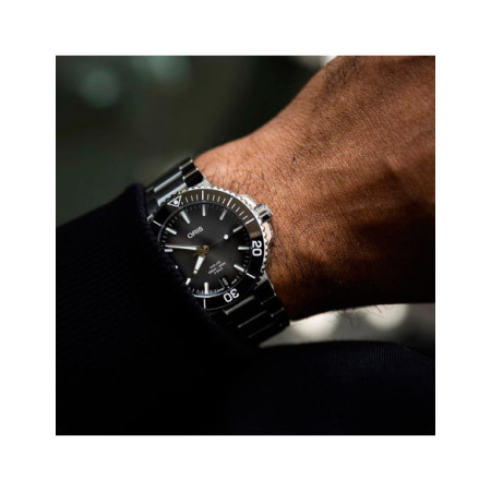 Reloj Oris Aquis Date Calibre 400 01 400 7769 4154-07 8 22 09PEB. Género: Mujer,Hombre. Material: Acero,Cerámica. Tamaño: De 39mm a 42mm. Correa: Acero. Color esfera: Gris. Estilo: Deportivo. Movimiento: Automático. Características técnicas: Hora y segundero,Calendario,Reserva de marcha
