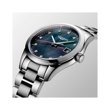 Reloj Longines Conquest Classic L2.386.4.88.6. Género: Mujer. Material: Acero. Tamaño: De 32mm a 38mm. Correa: Acero. Color esfera: Nácar. Estilo: Clásico,Cocktail. Movimiento: Cuarzo. Características técnicas: Hora y segundero,Calendario