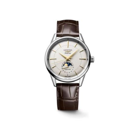 Reloj Longines Flagship Heritage Moonphase L4.815.4.78.2. Género: Hombre. Material: Acero. Tamaño: De 32mm a 38mm. Correa: Piel. Color esfera: Plata. Estilo: Cocktail,Clásico. Movimiento: Automático. Características técnicas: Hora y segundero,Calendario,Fases lunares,Reserva d