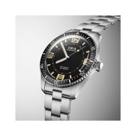 Reloj Oris Divers 60th Anniversary Edition 01 733 7772 4034-Set. Género: Hombre. Material: Acero. Tamaño: De 39mm a 42mm. Correa: Acero. Color esfera: Negro. Estilo: Deportivo. Movimiento: Automático. Características técnicas: Hora y segundero,Reserva de marcha