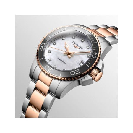Reloj Longines HydroConquest L3.370.3.89.6. Género: Mujer. Material: Acero. Tamaño: De 32mm a 38mm. Correa: Acero. Color esfera: Nácar. Estilo: Cocktail. Movimiento: Cuarzo. Características técnicas: Calendario,Hora y segundero