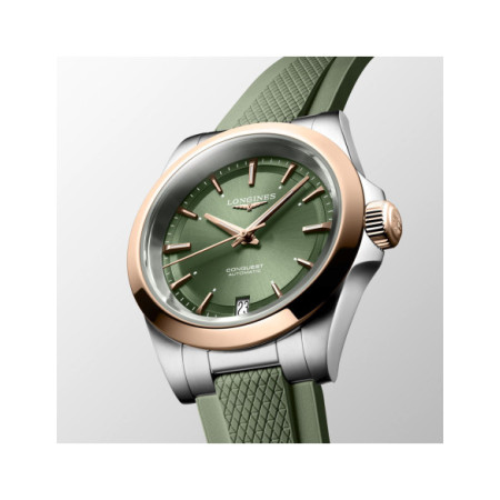 Reloj Longines Conquest 34MM L3.430.5.02.9. Género: Mujer. Material: Acero/Oro. Tamaño: De 32mm a 38mm. Correa: Caucho. Color esfera: Verde. Estilo: Deportivo. Movimiento: Automático. Características técnicas: Calendario,Hora y segundero,Reserva de marcha
