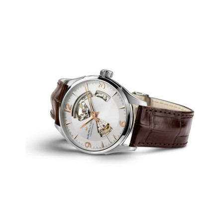 Reloj Hamilton Jazzmaster Open Heart Auto H32705551. Género: Hombre. Material: Acero. Tamaño: De 39mm a 42mm. Correa: Piel. Color esfera: Plata. Estilo: Clásico. Movimiento: Automático. Características técnicas: Reserva de marcha,Hora y segundero
